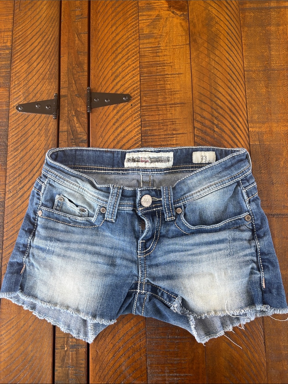 Distressed Light Wash Denim Cutoff Shorts - Size 23